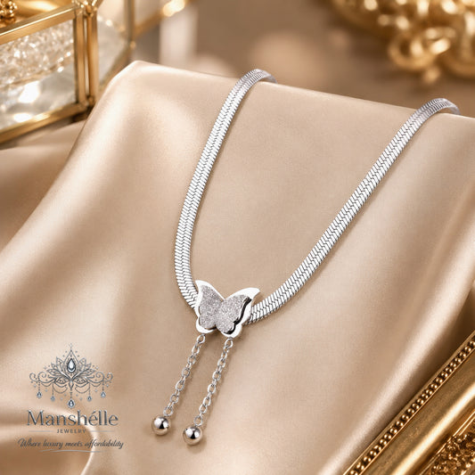 Manshélle Silver Flutter Tassel Necklace
